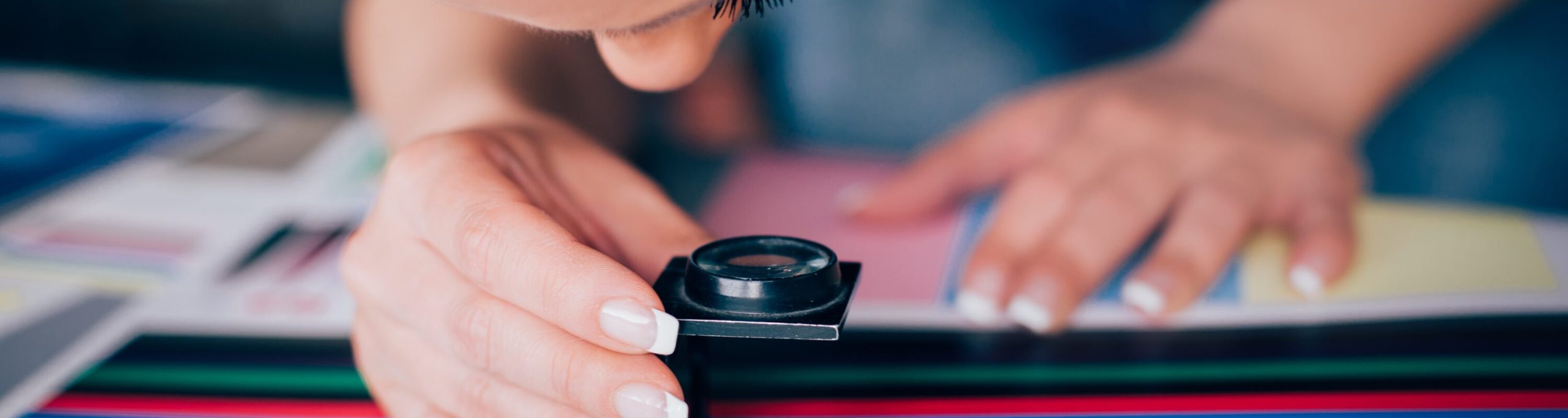 Worker,In,A,Printing,And,Press,Centar,Uses,A,Magnifying